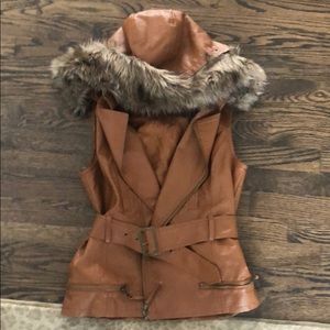Adorable fake leather vest with fur zip off hood!